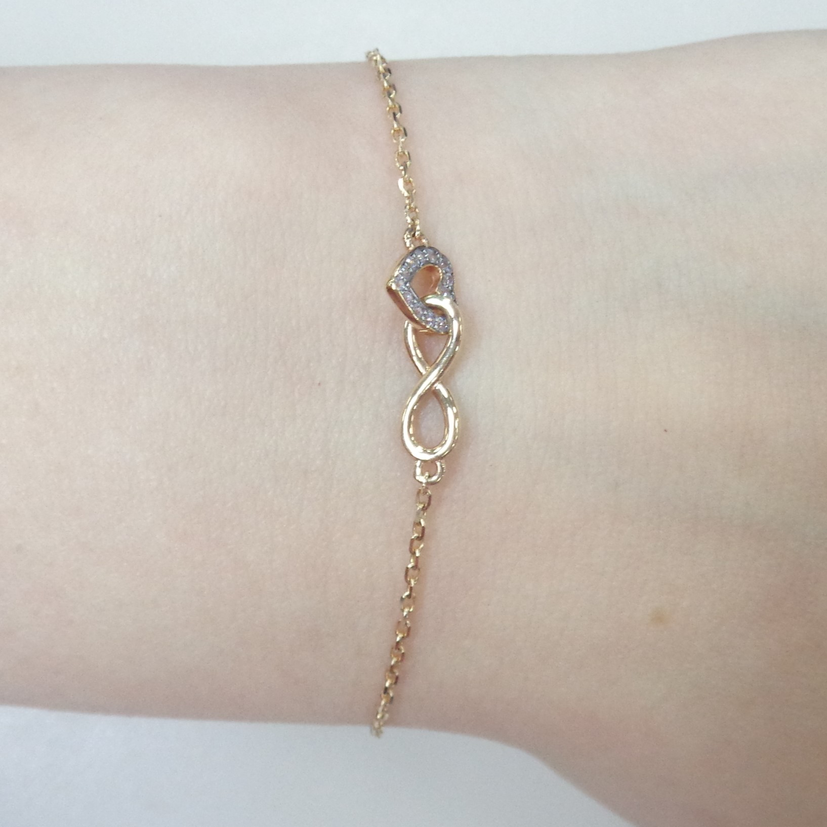 Золотой браслет 585 пробы; родий; плетение Якорное; вставки 14 Фианит бесцв.;